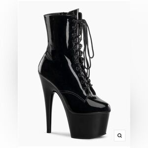 Black Pleasers size 8, worn once for Halloween.